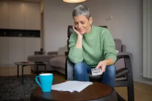 Middle-aged woman analyzing her hormonal profile